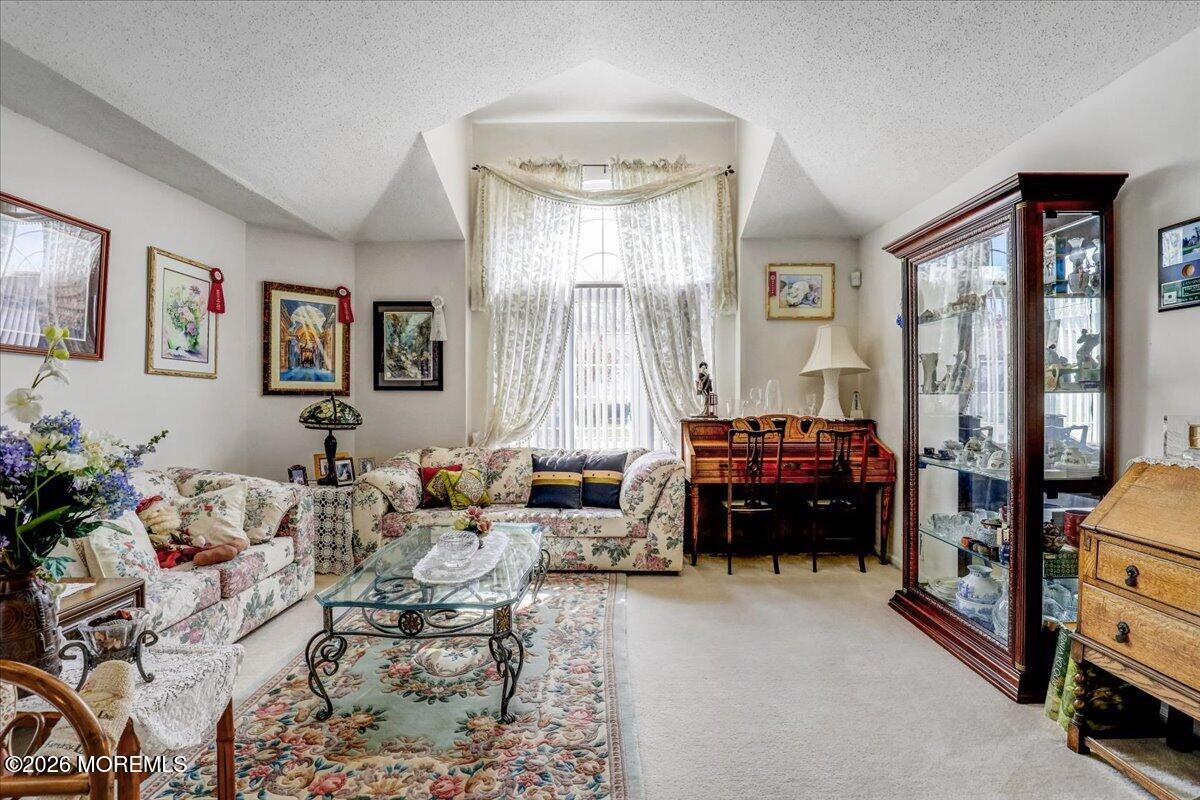 24 Merion Lane Jackson, NJ 08527 - Photo 5 of 45 a living room with furniture and a large window
