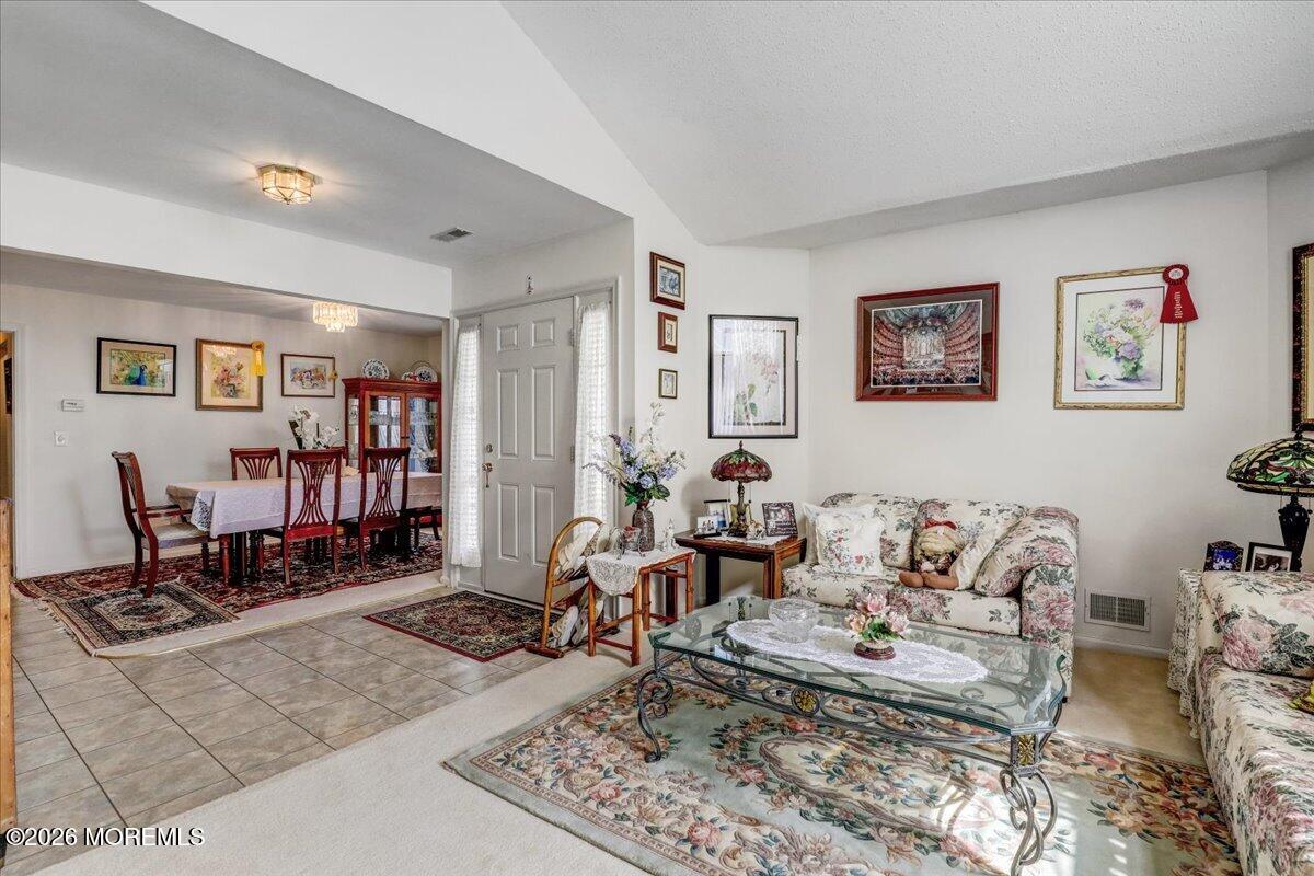 24 Merion Lane Jackson, NJ 08527 - Photo 6 of 45 a living room with furniture and wooden floor
