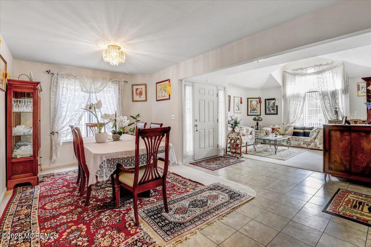 24 Merion Lane Jackson, NJ 08527 - Photo 8 of 45 a view of a livingroom and dining room