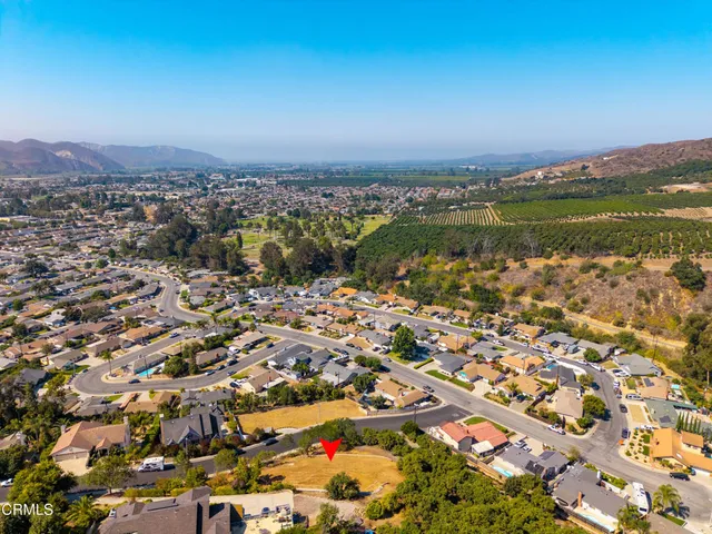 an aerial view of a city with lots of residential buildings