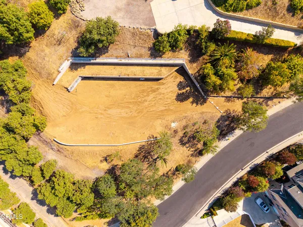a view of swimming pool from a balcony