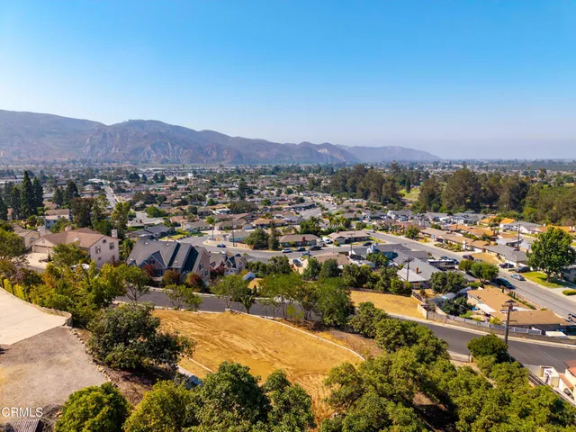 a view of a city with a mountain