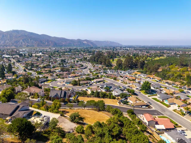 an aerial view of residential house with outdoor space