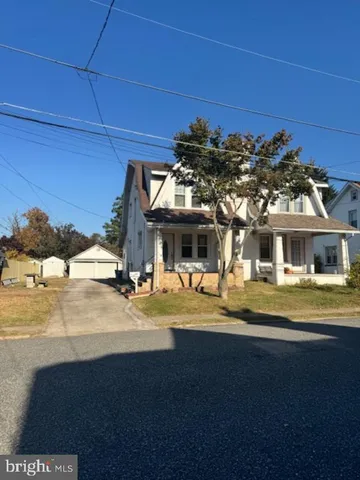 a view of a building and a yard