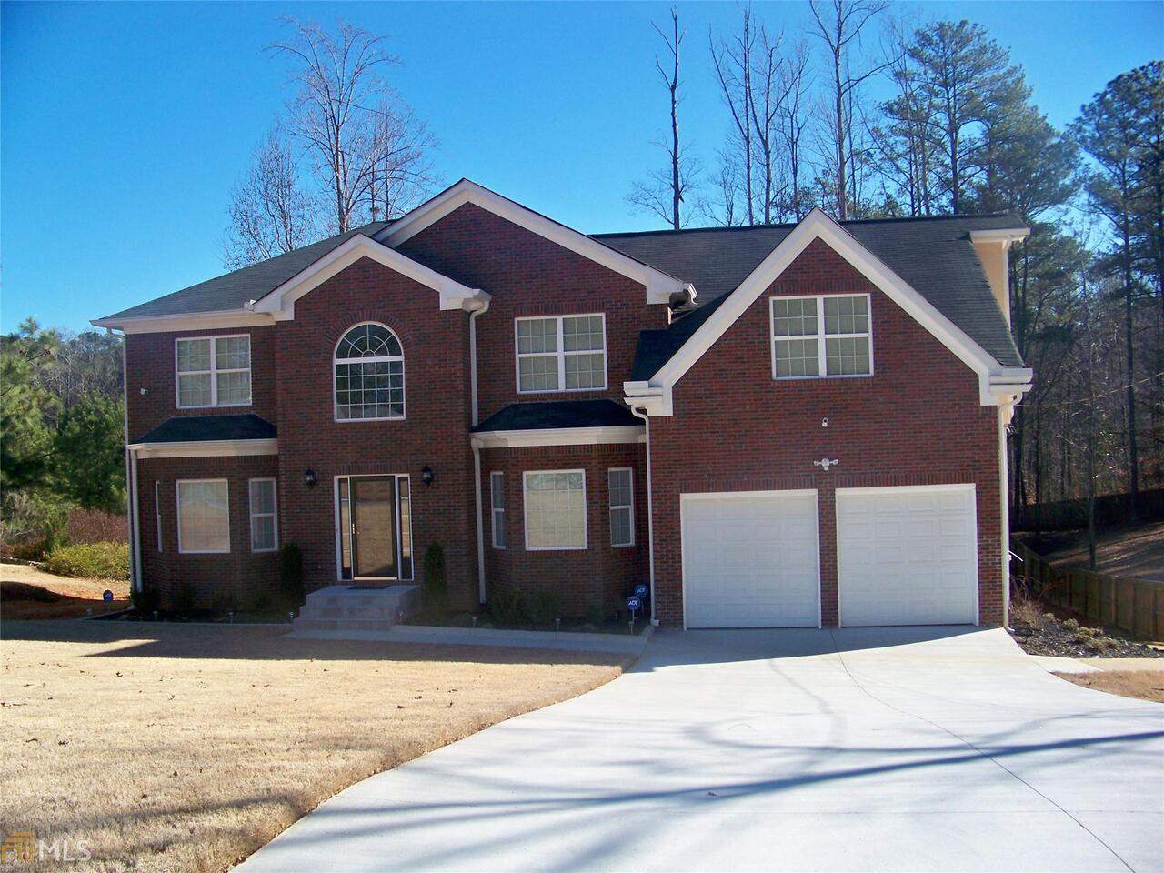 1860 Austin Road Southwest Atlanta, GA 30331 - Photo 1 of 1 a front view of a house with yard