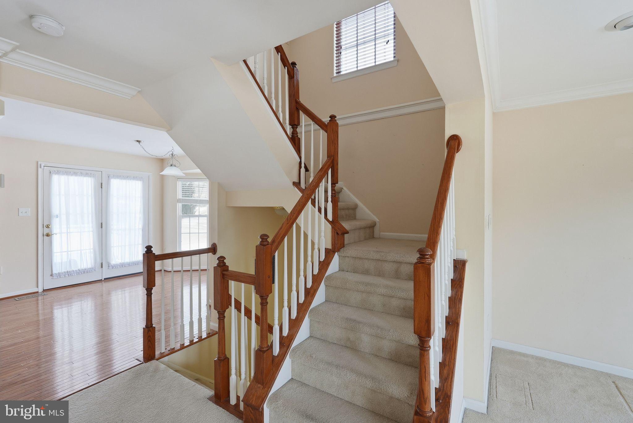 3 Carriage House Road Pottstown, PA 19465 - Photo 13 of 26 Inviting staircase in a bright foyer.