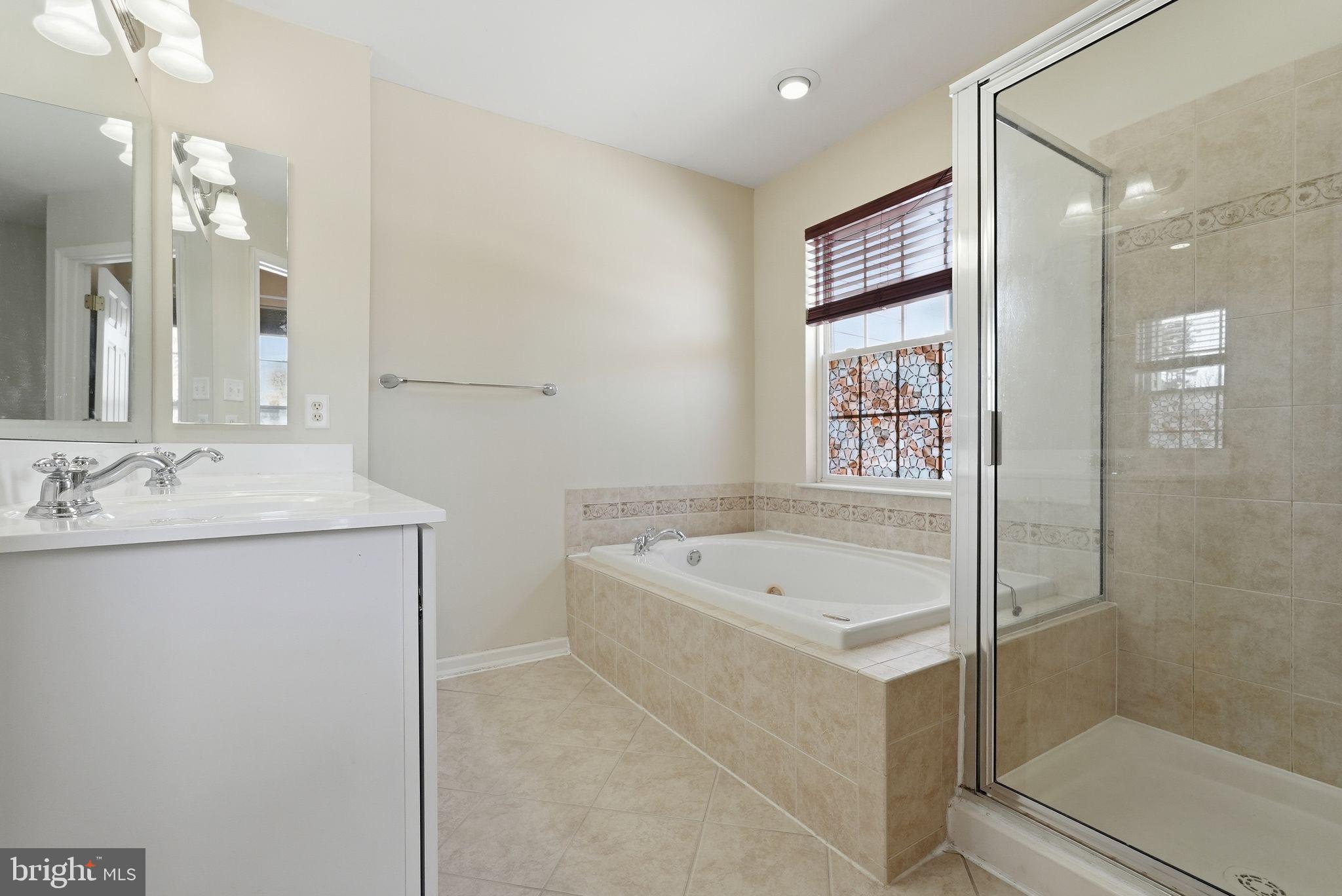 3 Carriage House Road Pottstown, PA 19465 - Photo 16 of 26 Elegant bathroom with natural light.