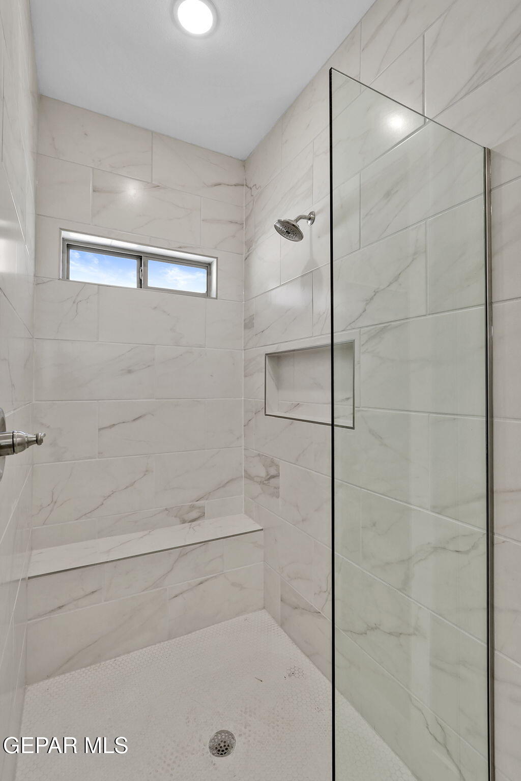 8409 Phil Place Vinton, TX 79821 - Photo 9 of 20 a bathroom with a shower