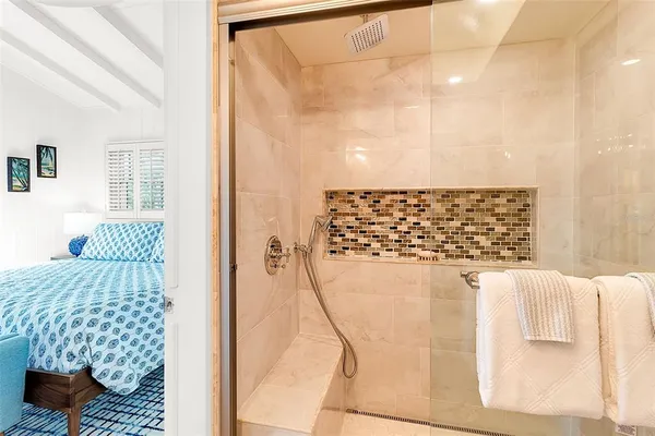 kids bedroom with a large window