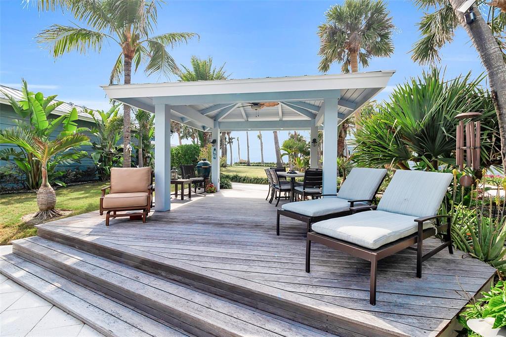 621 Casey Key Road Nokomis, FL 34275 - Photo 29 of 51 a balcony with furniture and a potted plant