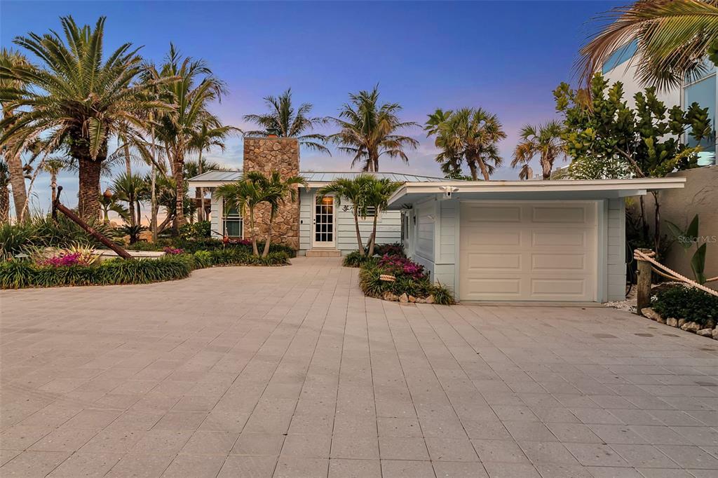 621 Casey Key Road Nokomis, FL 34275 - Photo 32 of 51 front view of a house with a street