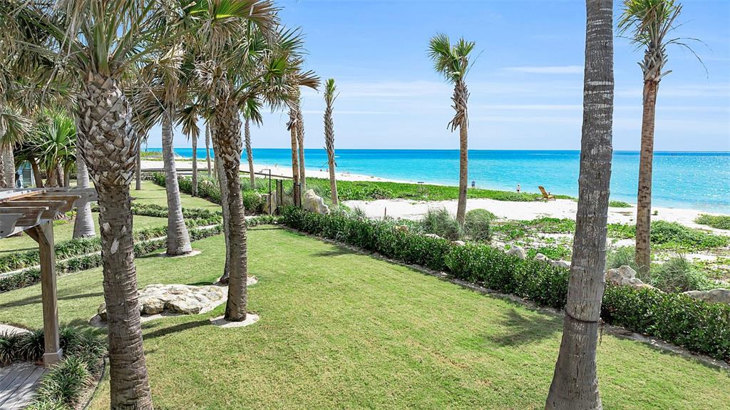 621 Casey Key Road Nokomis, FL 34275 - Photo 8 of 51 a view of a garden with a tree