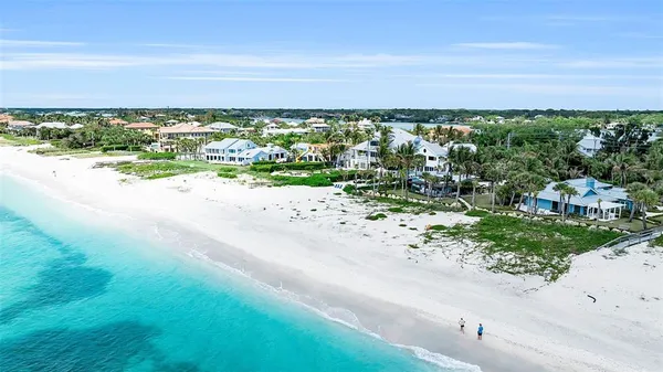 a view of a beach with a ocean view