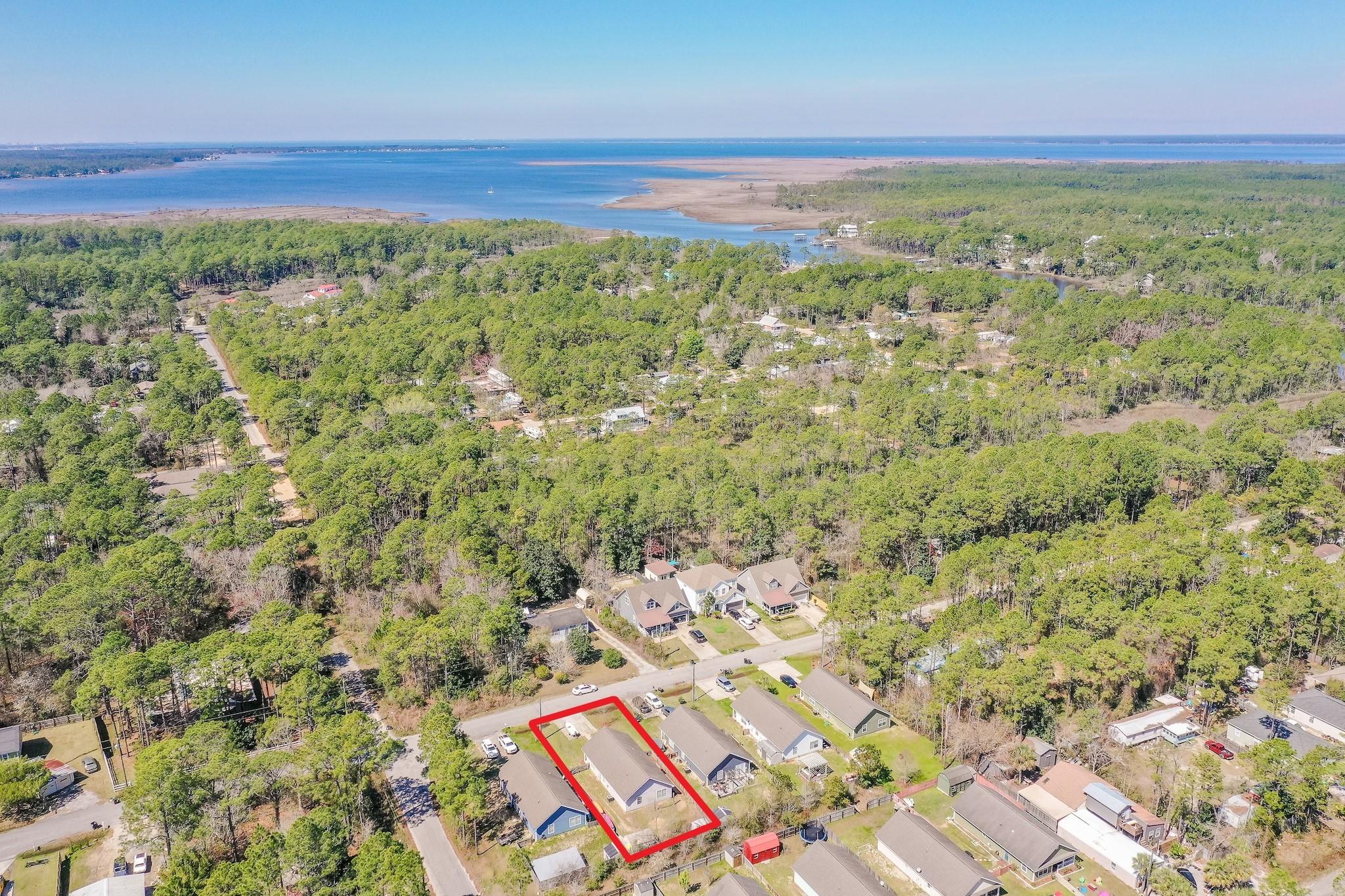 20 4th Street Santa Rosa Beach, FL 32459 - Photo 2 of 41 a view of a yard