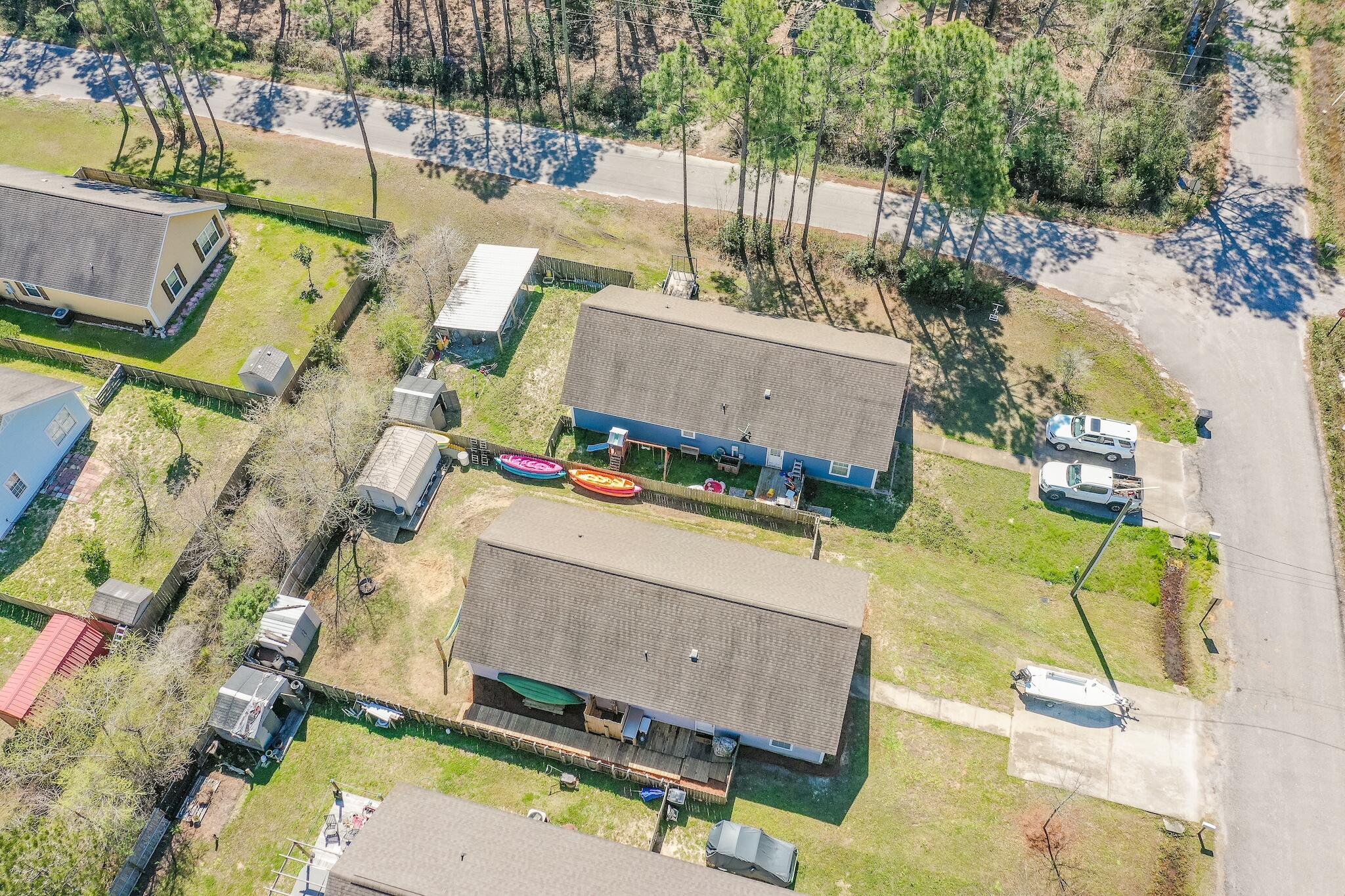 20 4th Street Santa Rosa Beach, FL 32459 - Photo 3 of 41 an aerial view of residential houses with outdoor space