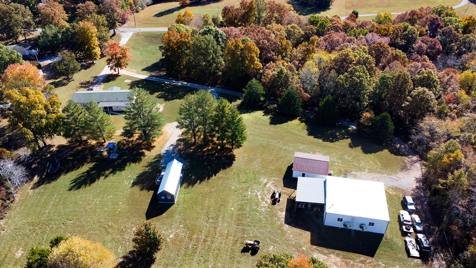 886 Roy Donegan Road Dickson, TN 37055 - Photo 54 of 60 an aerial view of residential houses with outdoor space