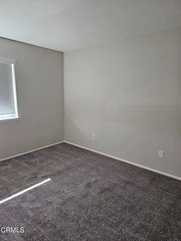 a backyard of a house with seating space