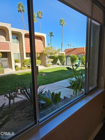 a view of a porch with a yard