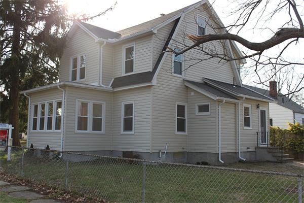 55 Alvin Street Springfield, MA 01104 - Photo 2 of 23 a view of a house with a yard