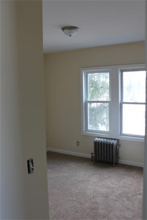 55 Alvin Street Springfield, MA 01104 - Photo 8 of 23 an empty room with a window