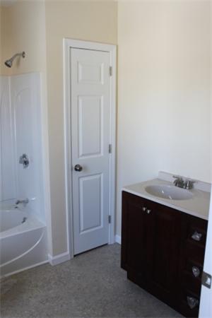 55 Alvin Street Springfield, MA 01104 - Photo 9 of 23 a bathroom with a sink and a bathtub