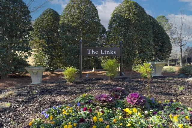 a view of a swimming pool and an outdoor space