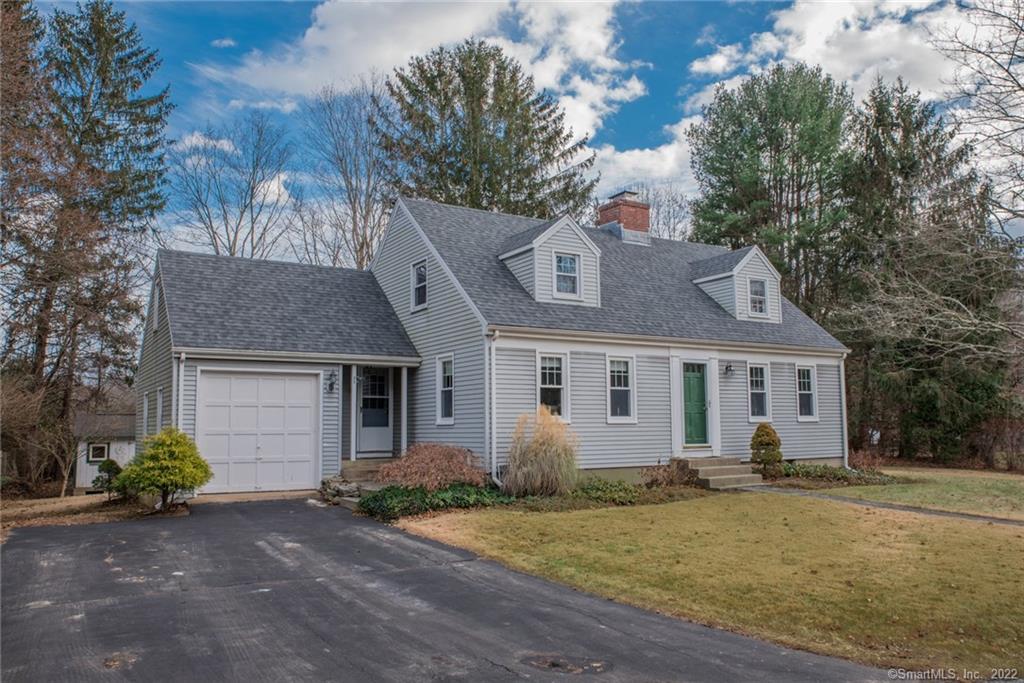 19 Hillside Road Old Lyme, CT 06371 - Photo 1 of 1 a front view of house with yard and trees around