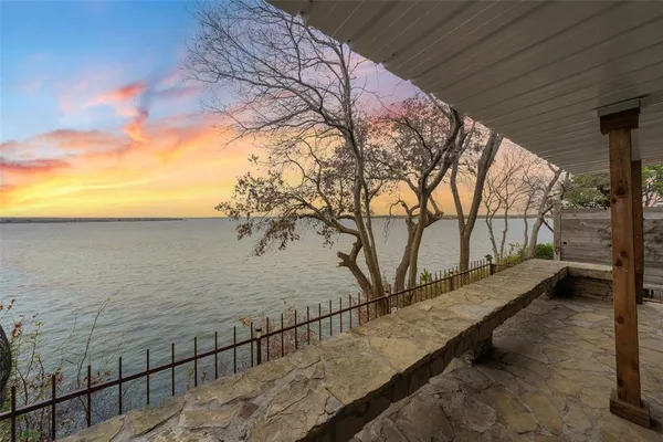 a view of ocean with a yard