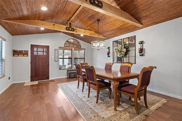 a view of a dining room with furniture