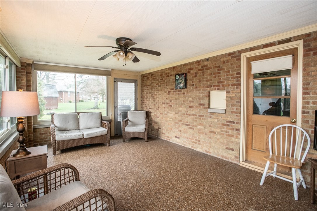 13740 Old Pleasant Valley Road Cleveland, OH 44130 - Photo 11 of 28 Sunroom featuring a ceiling fan