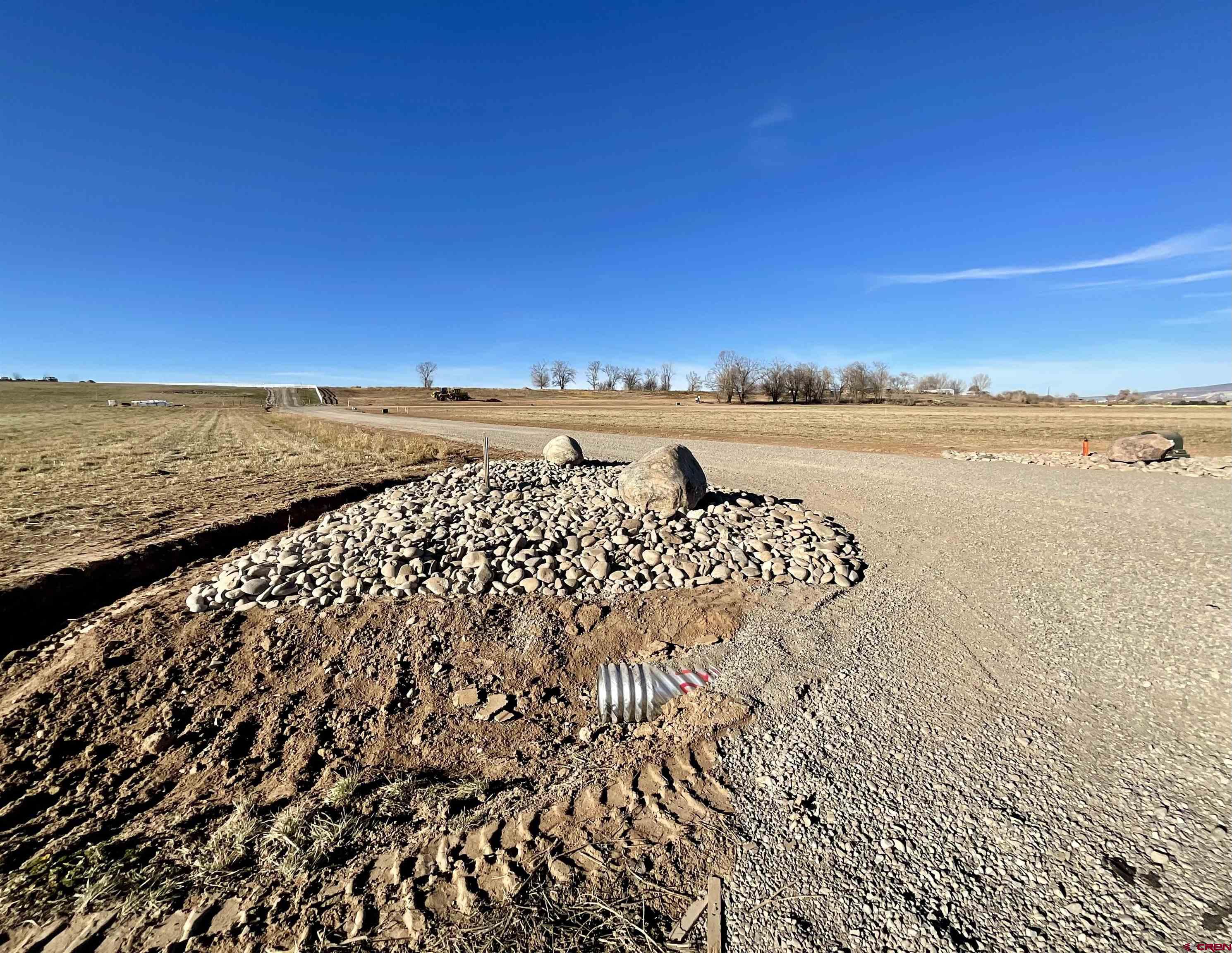 Tbd Lot 2 Bronco Court Delta, CO 81416 - Photo 8 of 8 a view of an ocean and beach