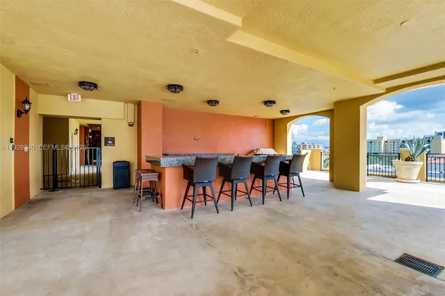 a view of a livingroom with furniture and a rug