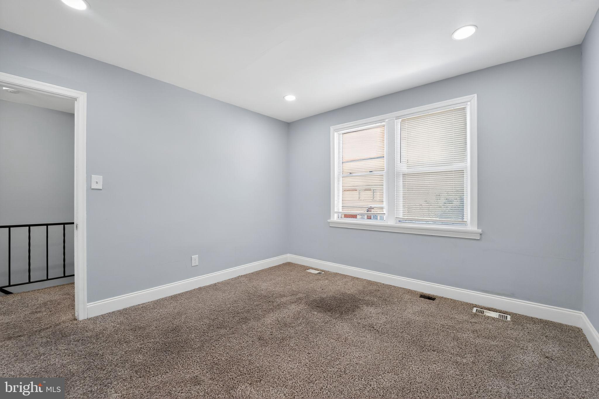 3807 Elkader Road Baltimore, MD 21218 - Photo 24 of 30 a big room with windows