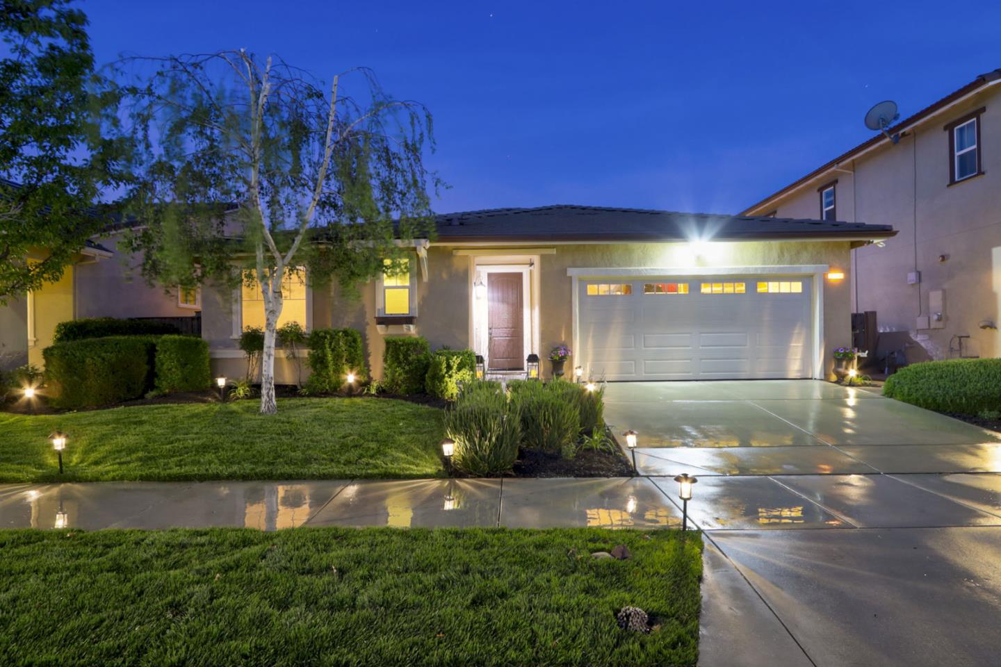 9534 Rodeo Drive Gilroy, CA 95020 - Photo 2 of 73 a front view of a house with garden