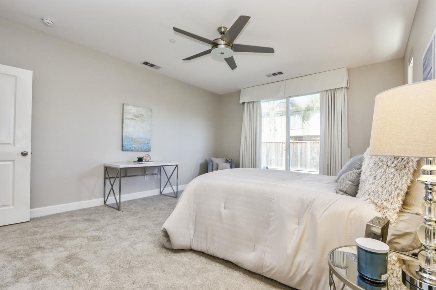 9534 Rodeo Drive Gilroy, CA 95020 - Photo 45 of 73 a bedroom with a bed and a table