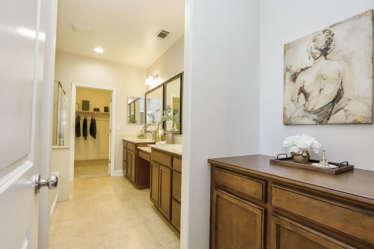 9534 Rodeo Drive Gilroy, CA 95020 - Photo 46 of 73 a bathroom with a sink and a mirror