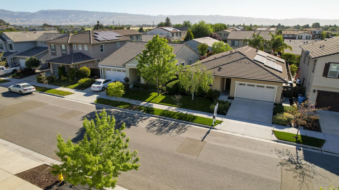 9534 Rodeo Drive Gilroy, CA 95020 - Photo 67 of 73 an aerial view of a house with a garden and mountain view