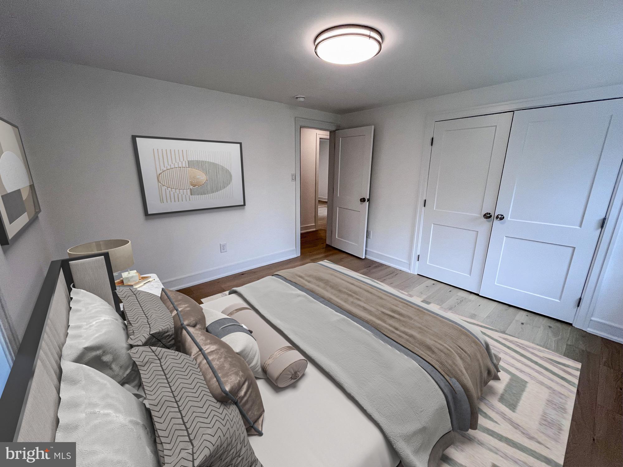 625 Conestoga Road Villanova, PA 19085 - Photo 13 of 30 a bedroom with a bed and a painting on the wall