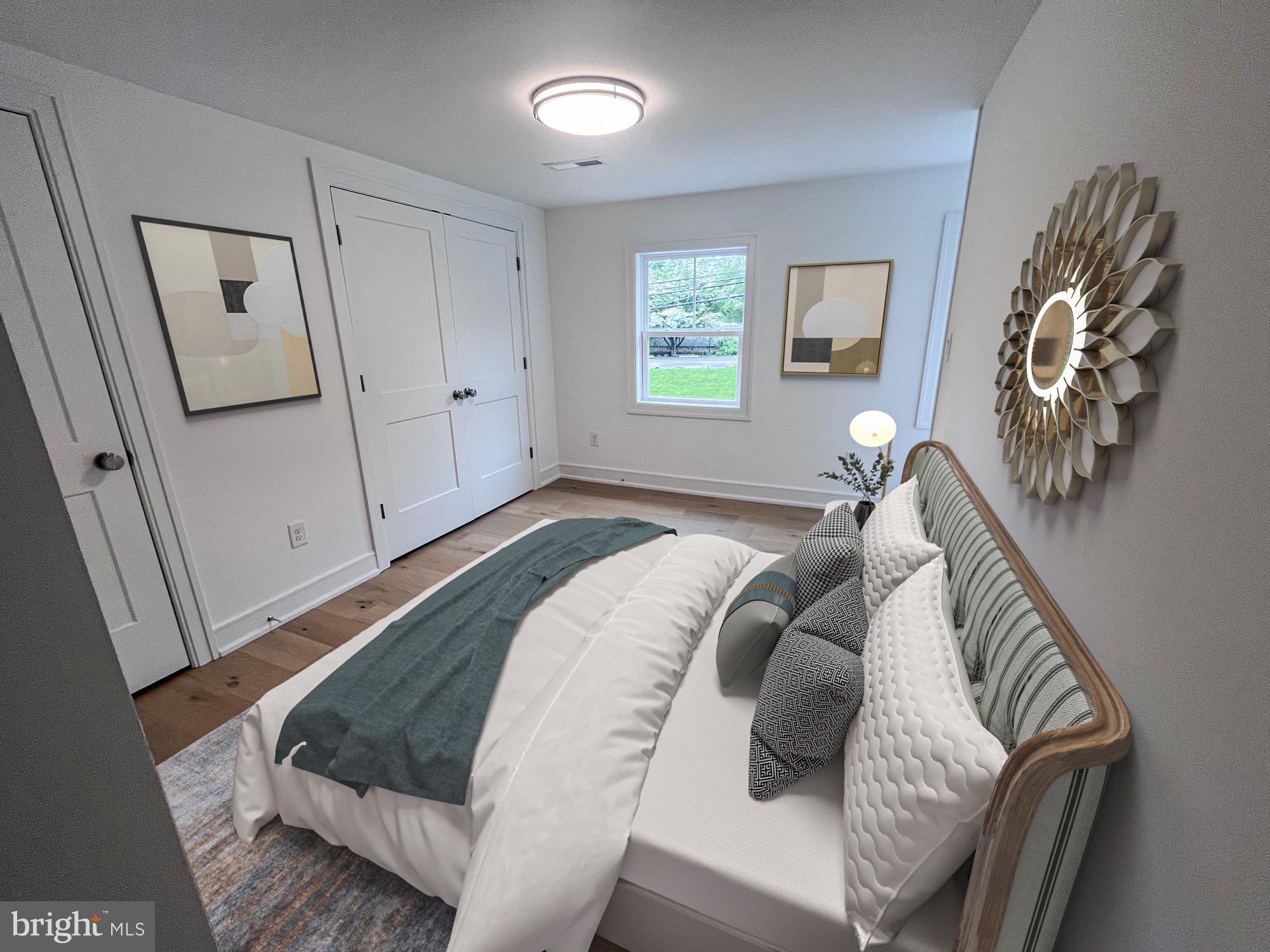 625 Conestoga Road Villanova, PA 19085 - Photo 20 of 30 a bed sitting in a bedroom next to a window