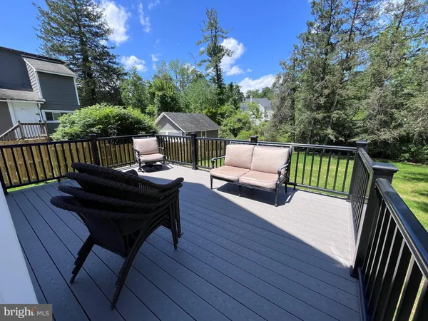 a view of a roof deck with couches