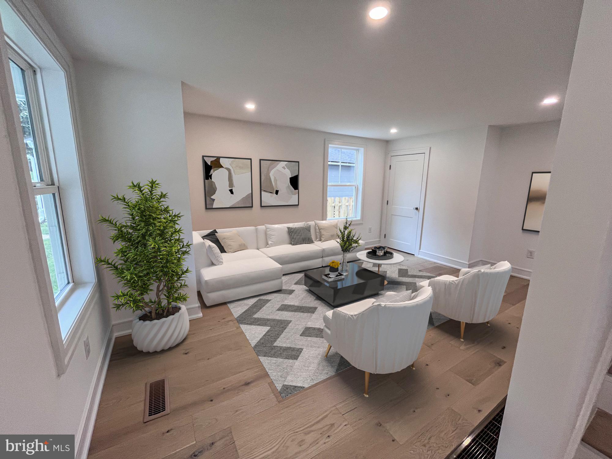 625 Conestoga Road Villanova, PA 19085 - Photo 5 of 30 a living room with furniture and a potted plant