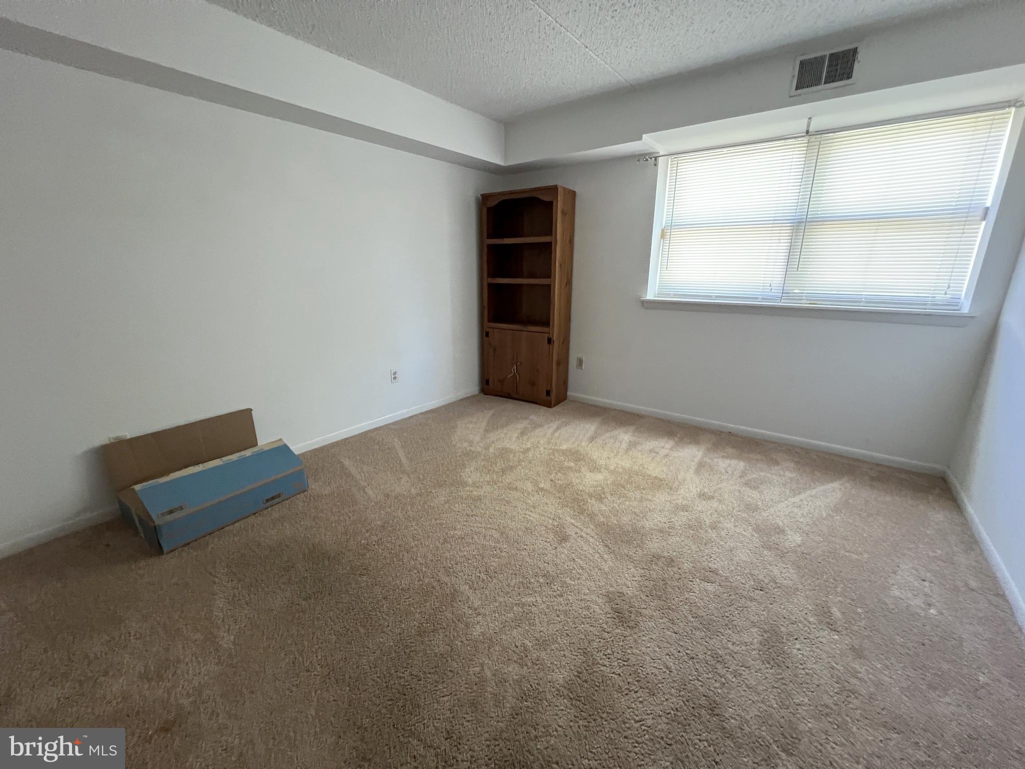 56 Welsh Tract Road Newark, DE 19713 - Photo 11 of 18 an empty room with windows