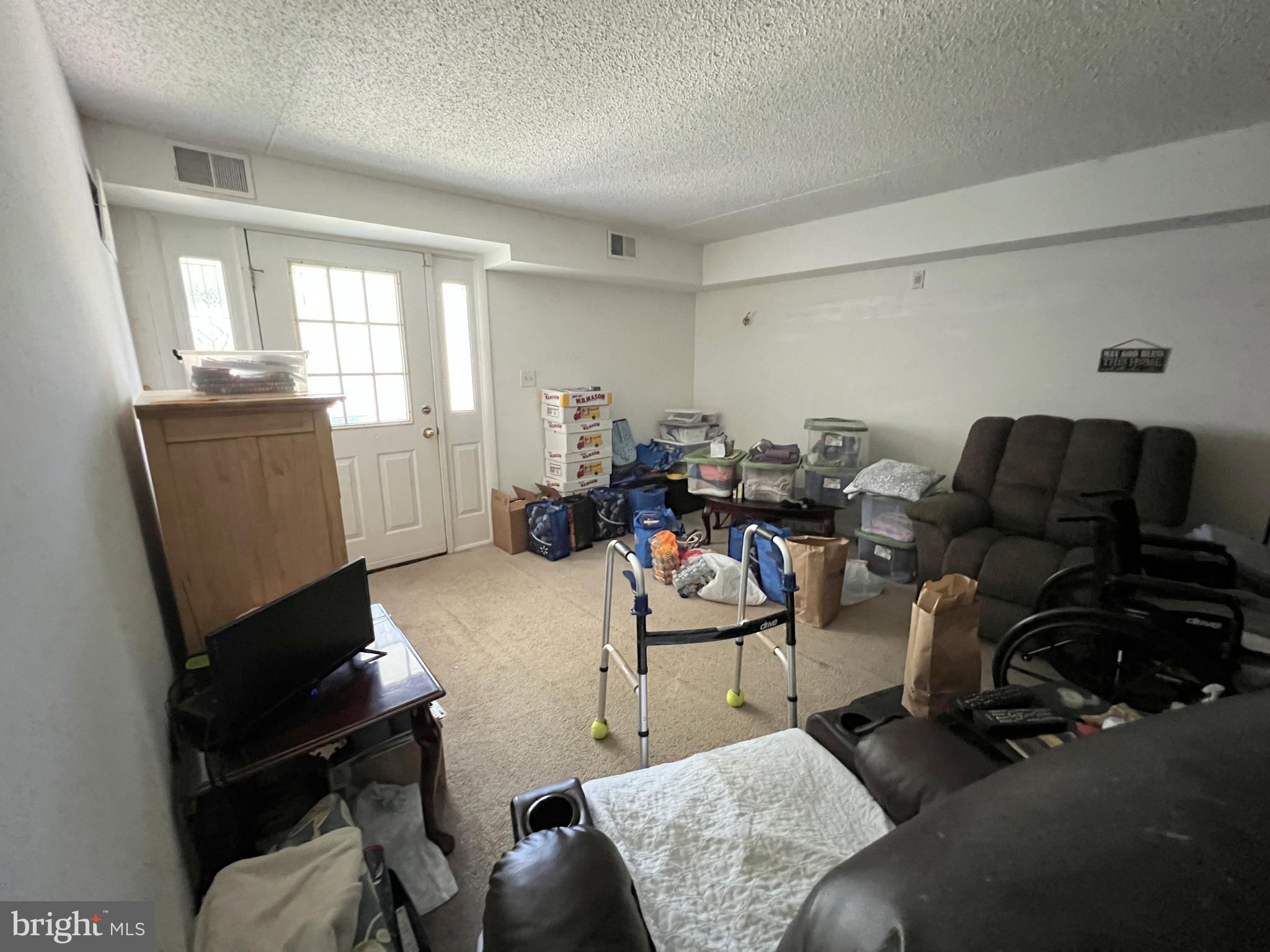56 Welsh Tract Road Newark, DE 19713 - Photo 13 of 18 a living room with furniture a couch and a window