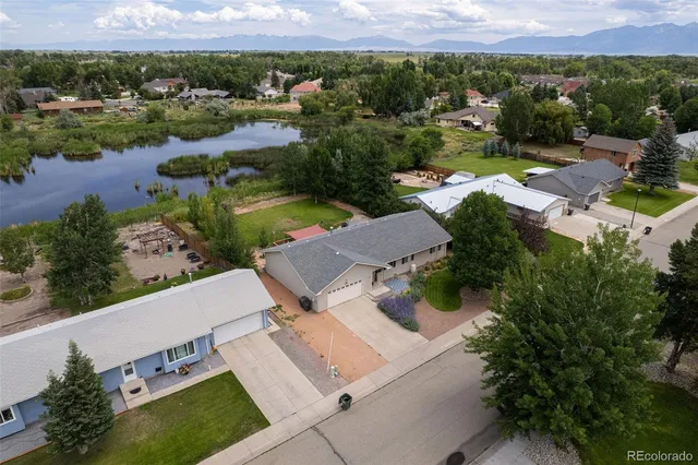 an aerial view of a house with a garden