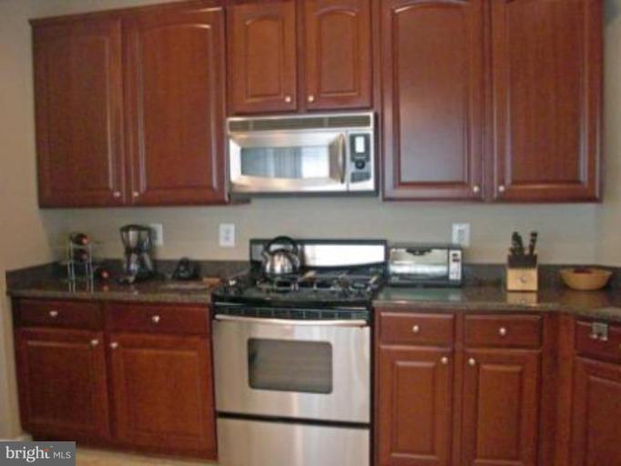 10275 Rutland Round Road, Unit 41 Columbia, MD 21044 - Photo 4 of 17 42" Cherry Wood Cabinets