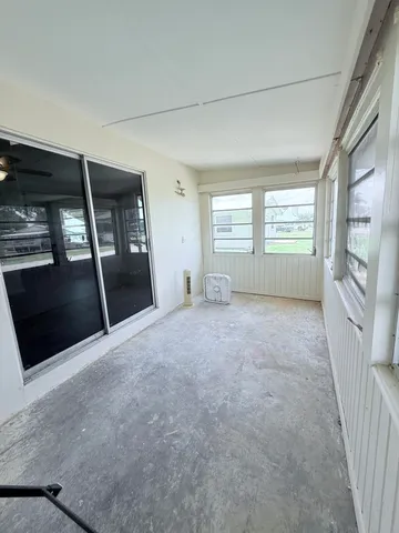 a view of empty room with front door
