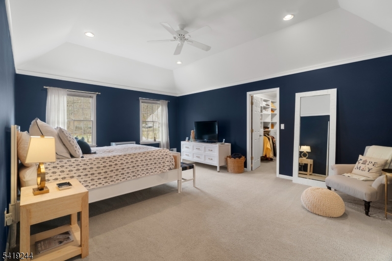 57 Paderewski Road Oak Ridge, NJ 07438 - Photo 24 of 42 a bedroom with furniture and large windows