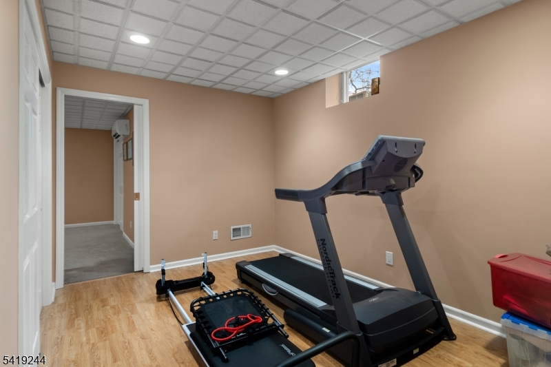 57 Paderewski Road Oak Ridge, NJ 07438 - Photo 27 of 42 a view of a room with gym equipment