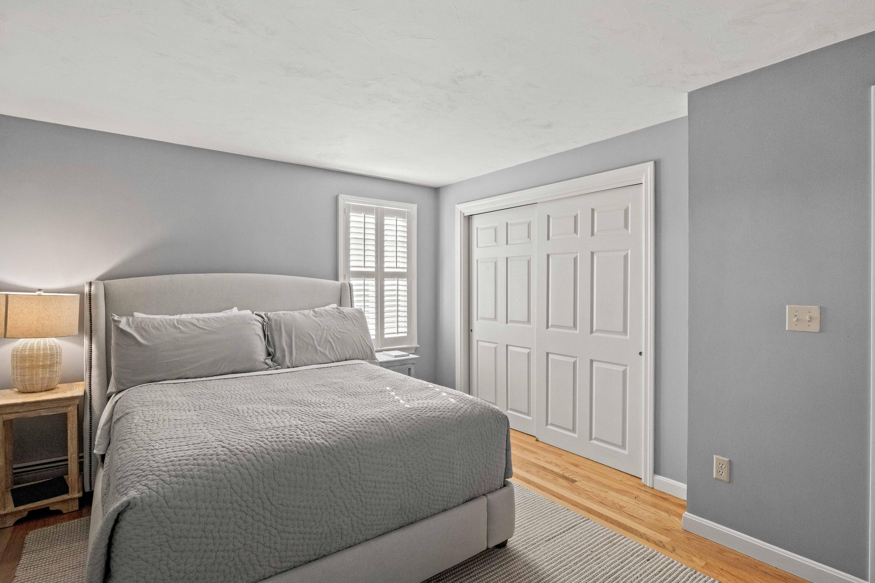 356 Lower County Road Harwich Port, MA 02646 - Photo 17 of 27 a bedroom with a bed and a window