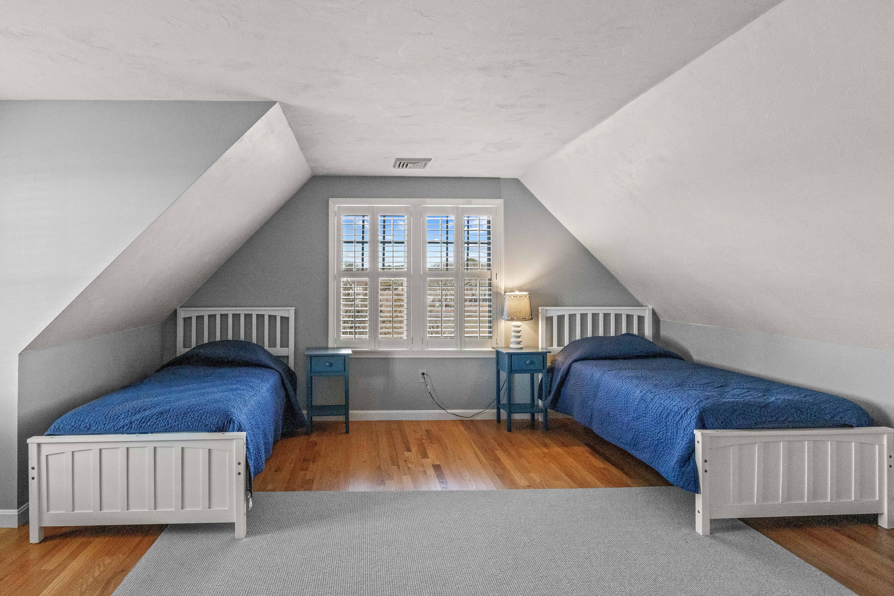 356 Lower County Road Harwich Port, MA 02646 - Photo 20 of 27 a living room with a bed furniture and a window